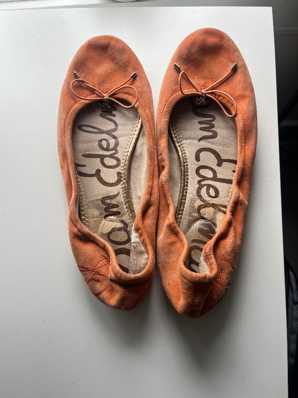 Classic and comfortable Sam Edelman ballet flats in a orange leather
